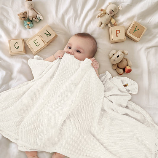 WHITE KNITTED BABY BLANKET