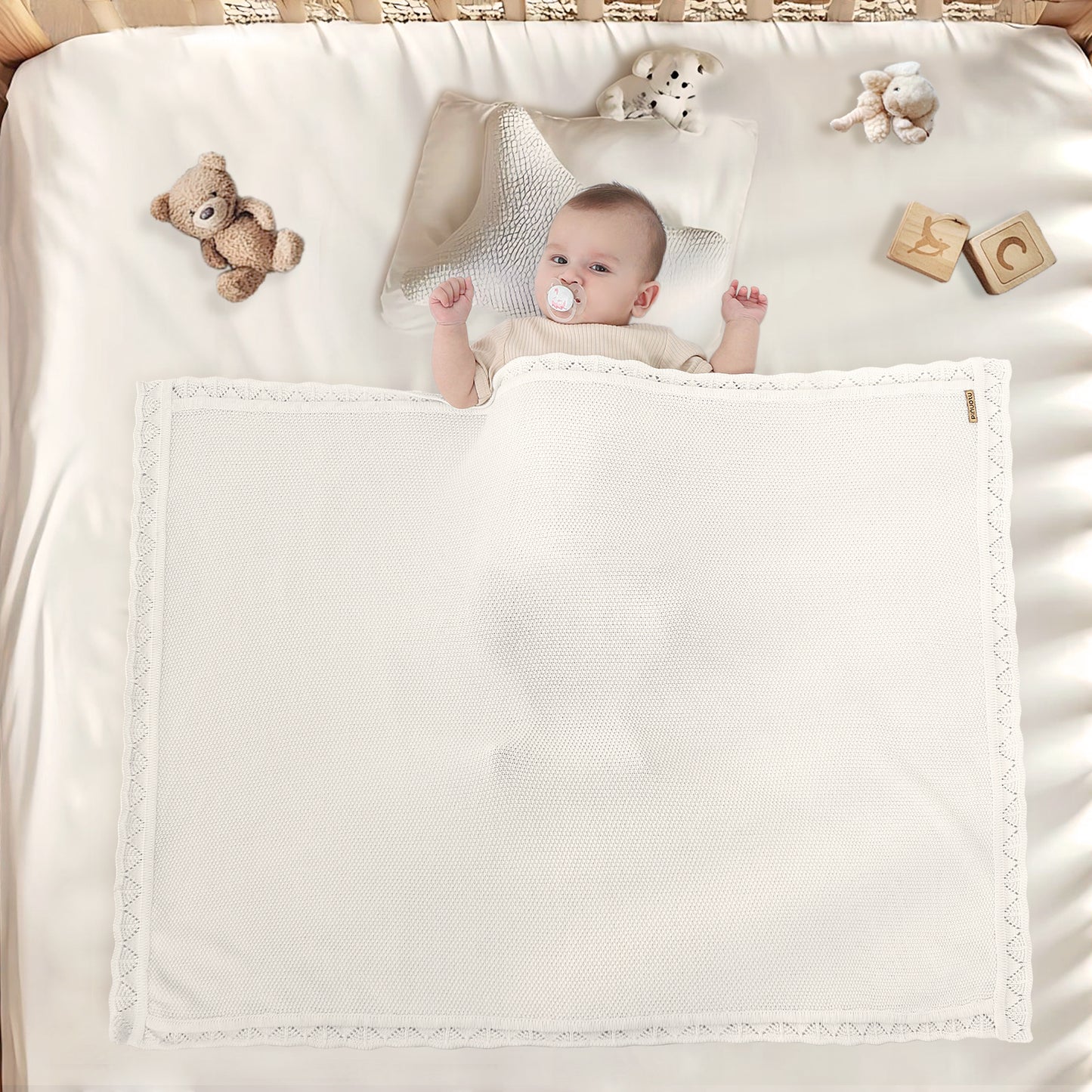 WHITE KNITTED BABY BLANKET