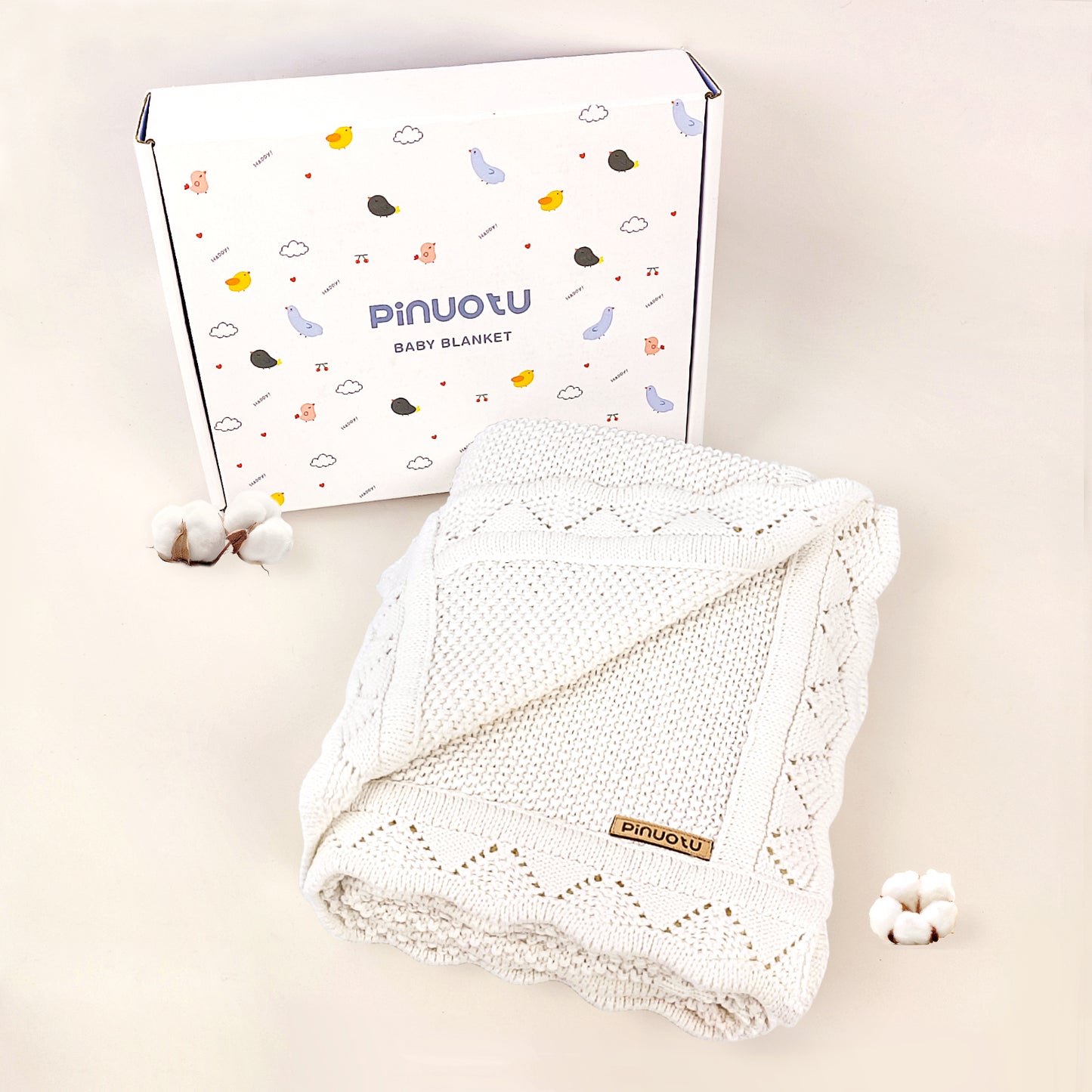 WHITE KNITTED BABY BLANKET