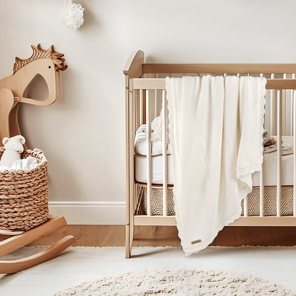 WHITE KNITTED BABY BLANKET